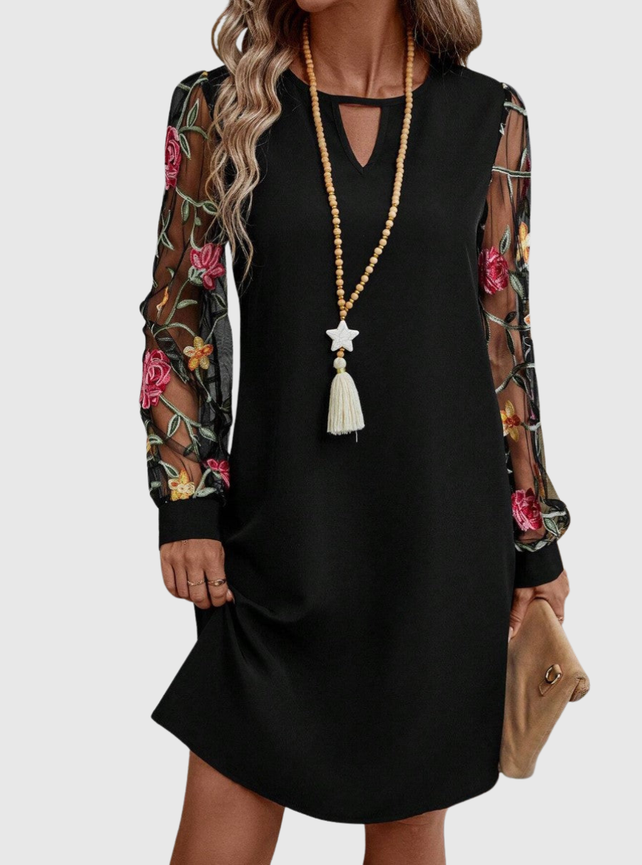 Jolanta | Elegancka sukienka z dekoltem w kształcie V i wyrazistymi rękawami